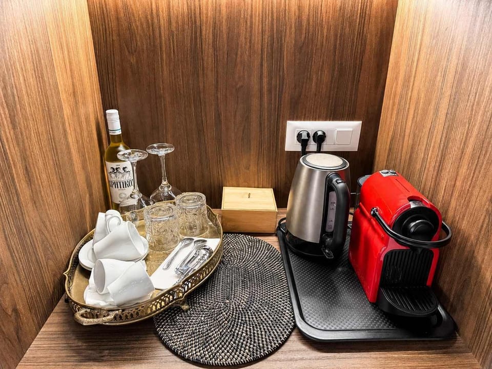 Coffee corner with espresso machine and welcome tray to enjoy a relaxing break anytime