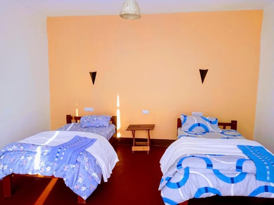 In-room safe, desk, laptop workspace, bed sheets