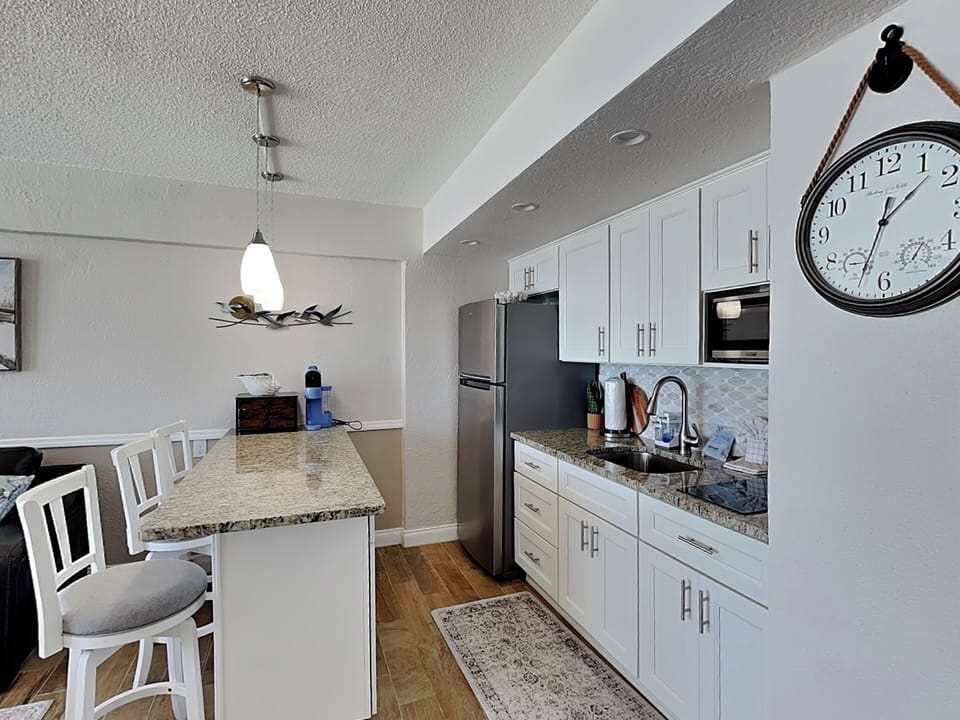 Fully Equipped Kitchen with Stainless Steel Appliances