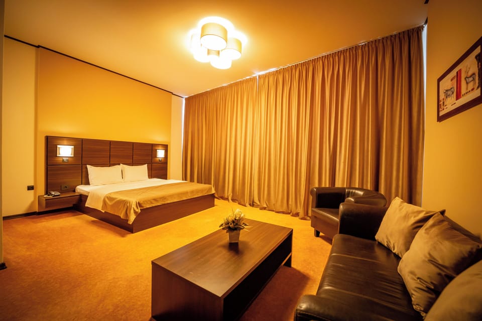 Minibar, desk, blackout drapes, iron/ironing board
