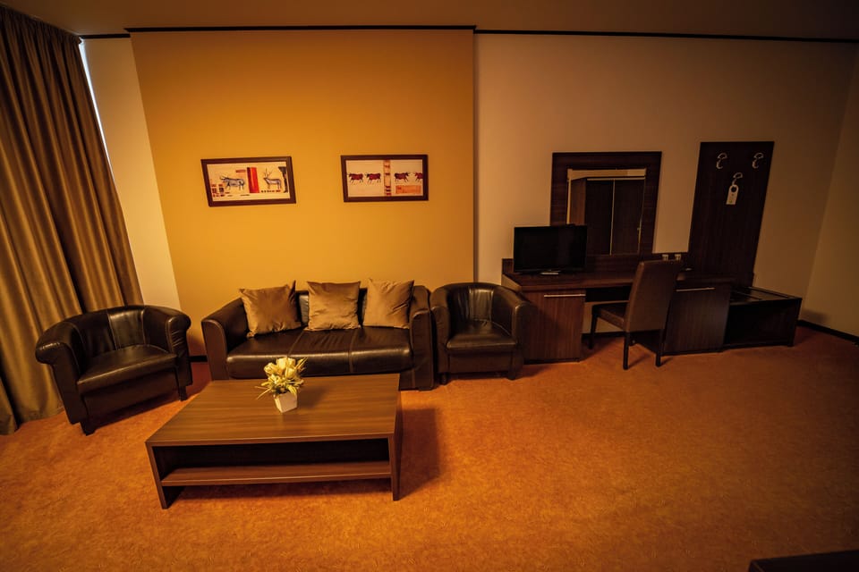 Single Room, Non Smoking | Living area | 80-cm LCD TV with digital channels