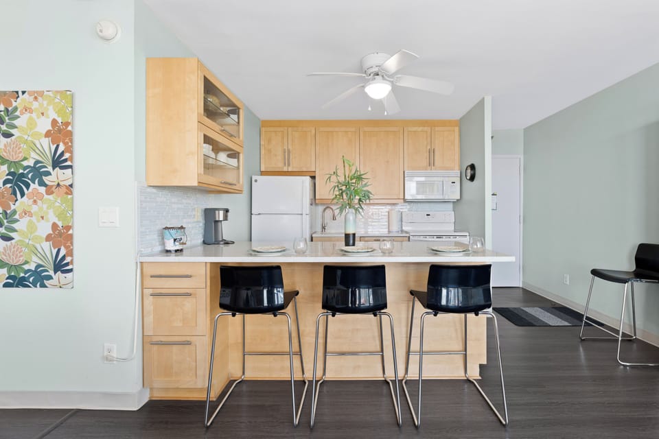 Kitchen Island with 3 barstools.