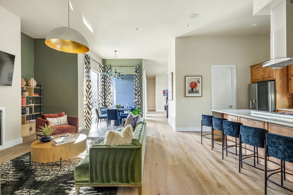Bright and airy great room with an open layout, contemporary finishes, and plenty of space for families and groups to relax together.