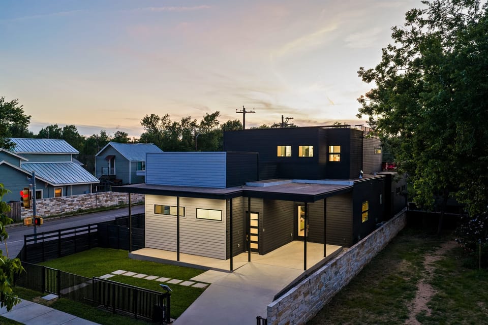 Stunning modern exterior with sleek architecture, private outdoor spaces, and a beautifully designed layout in the heart of Austin.