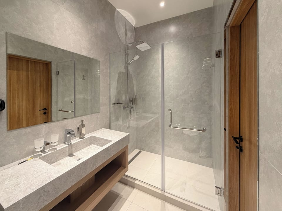 Shower, free toiletries, hair dryer, bathrobes