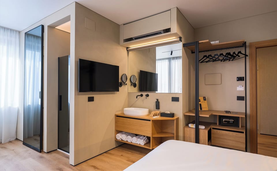 Superior Room, City View | Premium bedding, down comforters, minibar, in-room safe