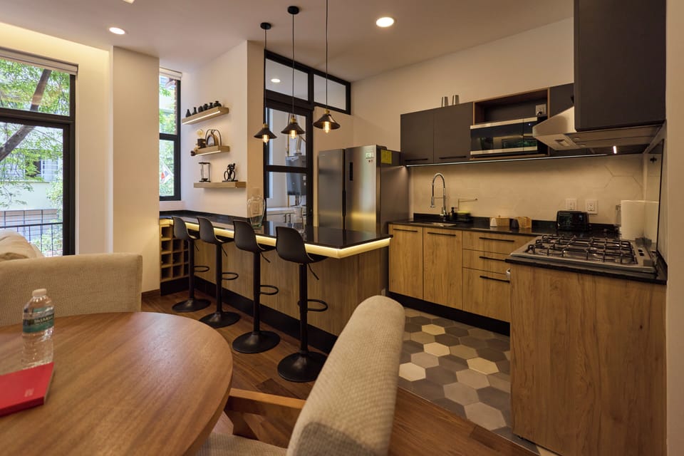 Superior Studio | Private kitchen | Fridge, oven, cookware/dishes/utensils