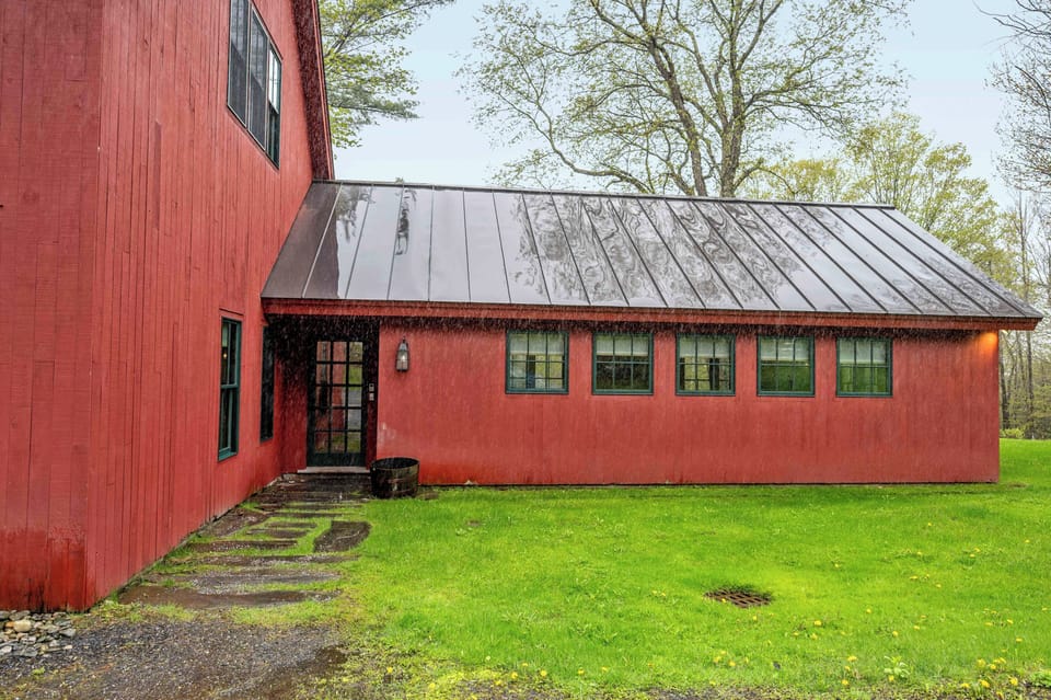 The apartment is in a larger barn.  This apartment has its own entrance on the right.