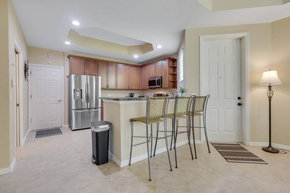The open kitchen keeps everyone connected during your stay.