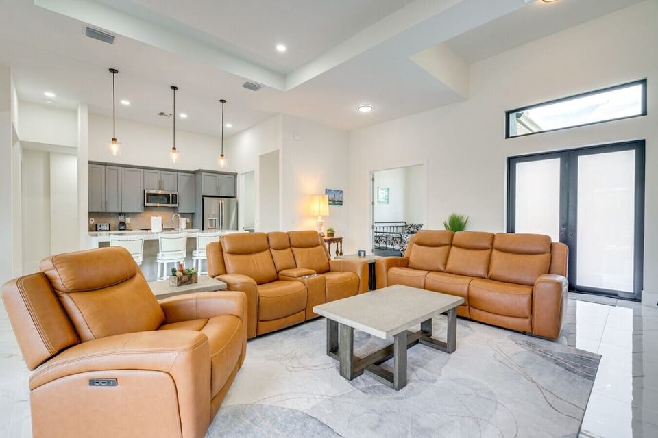 Living Room | Sofa & Smart TV | Open Floor Plan & Dining Area Access