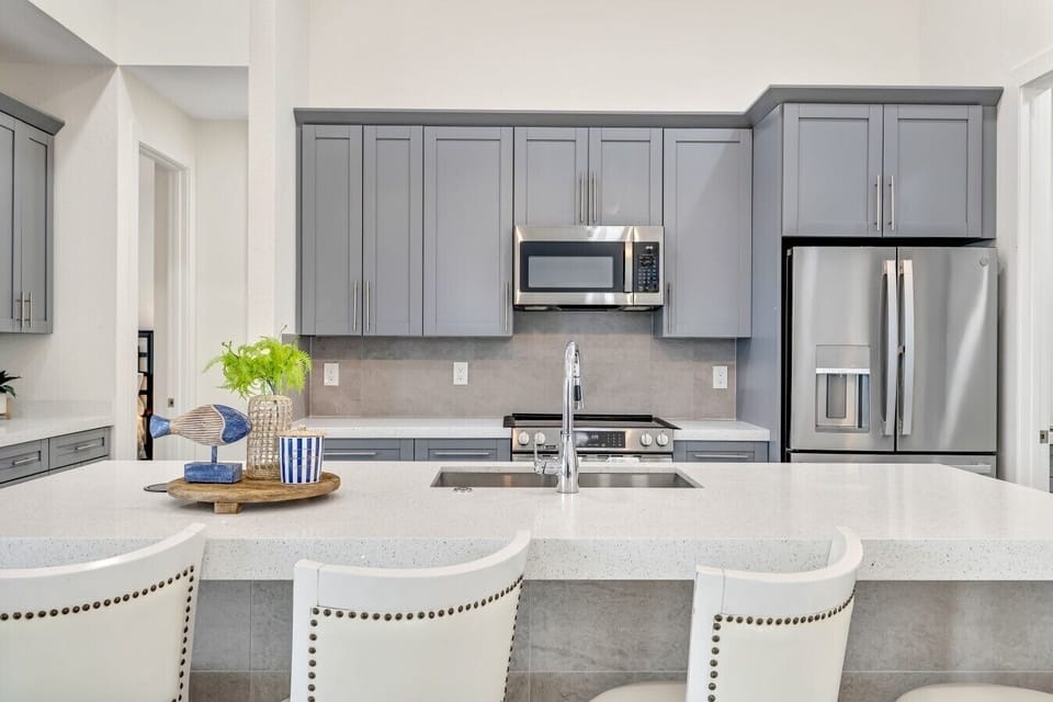 Kitchen | Stainless Steel Appliances | Breakfast Bar Seating