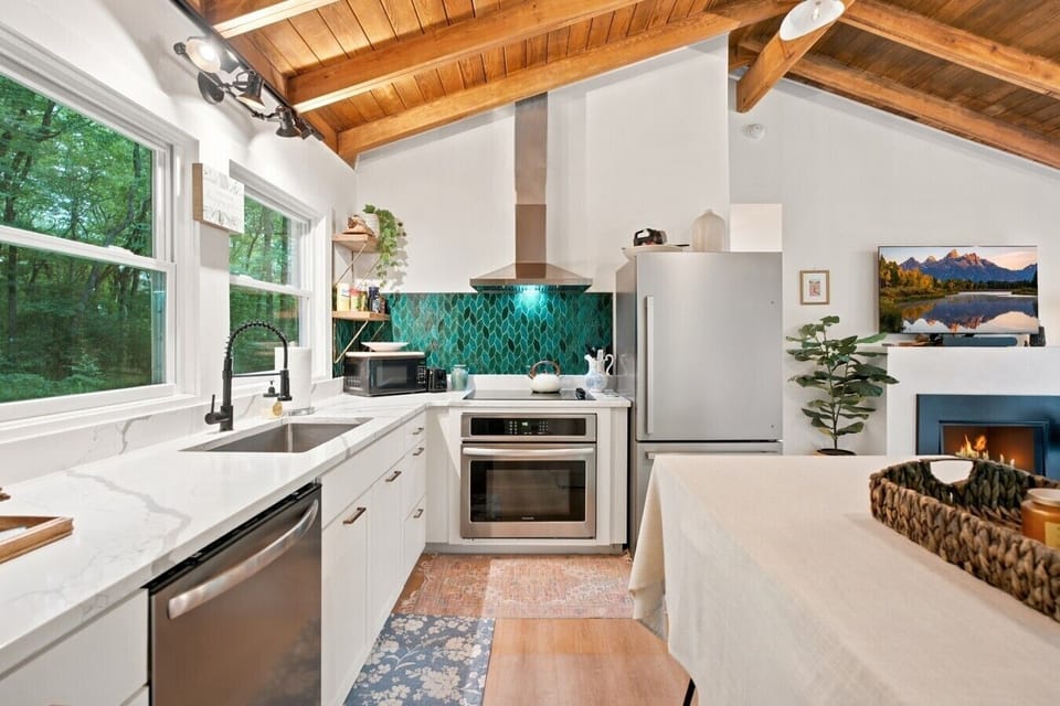 Kitchen | Teal Tile Backsplash | Stainless Appliances & Vaulted Wood Ceiling