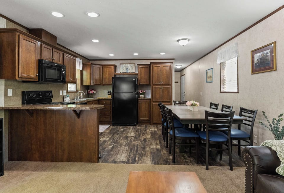Kitchen and dining space to comfortably cook for and seat 8.