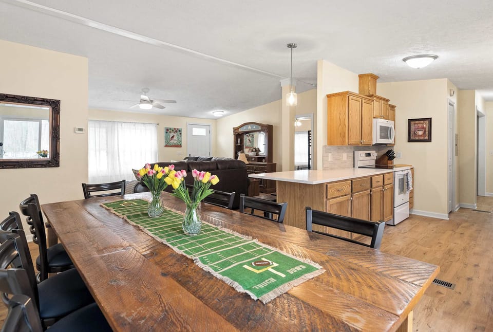 Open concept social space with 12 seating dining table