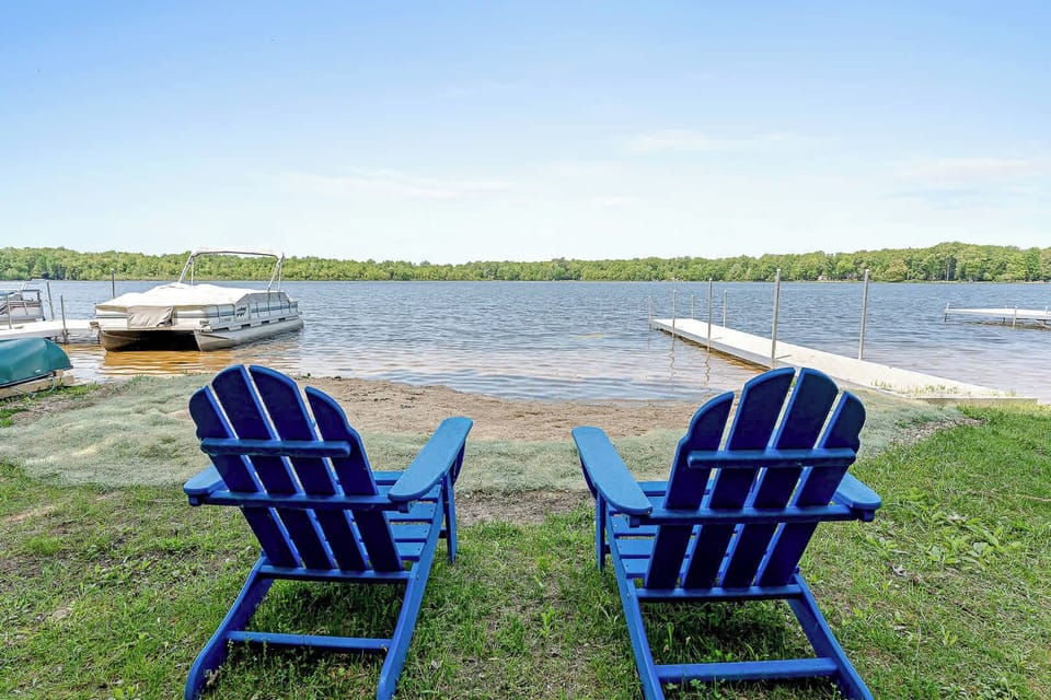 Sit down right next to Upper Scott Lake and take in the views in one of our Adirondack chairs as you enjoy the use of our private swimming areas & docks, located just one (1) mile away from the Four Quarters Properties