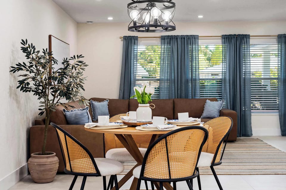 Relax and reconnect in this beautifully styled living and dining space featuring cozy seating, natural light, and elegant modern décor. Perfect for morning coffee, family meals, or winding down after a fun-filled day in paradise.