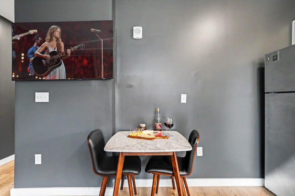 Dining area with seating for 2, perfect for morning coffee, casual meals, or unwinding with a glass of wine after a night out in Nashville.