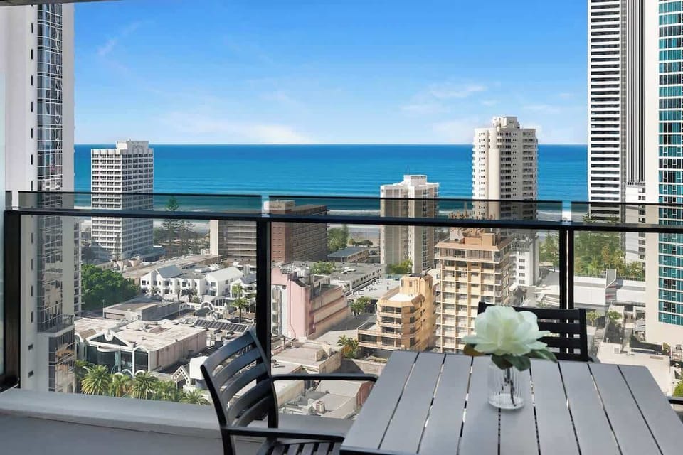 Wake up to sweeping ocean views and vibrant cityscapes. This private balcony offers the ultimate backdrop for morning coffees or sunset drinks, perfectly blending urban energy with coastal tranquility.