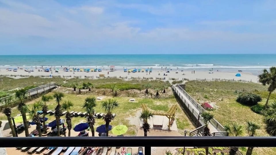 Direct beach access and panoramic ocean views create the perfect setting for your family vacation.