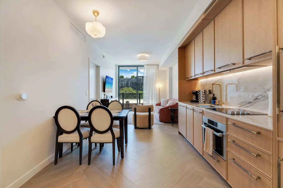 Sleek, modern culinary space featuring an open-concept layout designed for effortless cooking and entertaining.