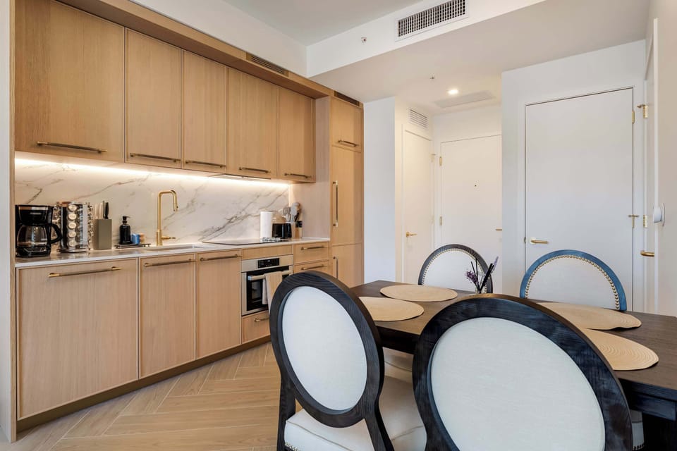 Fully stocked open-concept kitchen with expansive countertops, perfect for whipping up delicious meals.