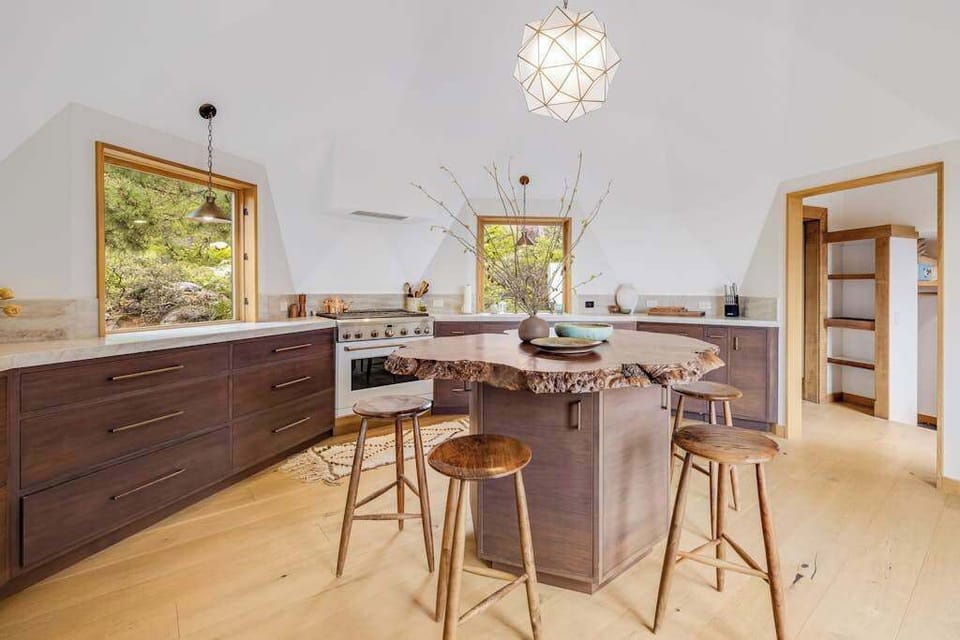 Unleash your inner chef in this gourmet kitchen, designed for culinary creativity with views that inspire every dish you create.