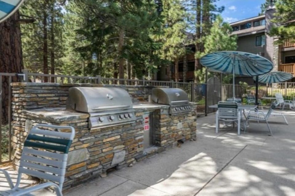 Outdoor grills and poolside dining tables