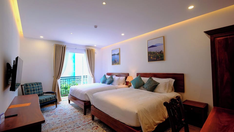 Basic Quadruple Room, 2 Double Beds, City View | In-room safe, iron/ironing board, free WiFi