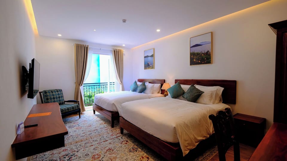 Basic Quadruple Room, 2 Double Beds, City View | In-room safe, iron/ironing board, free WiFi