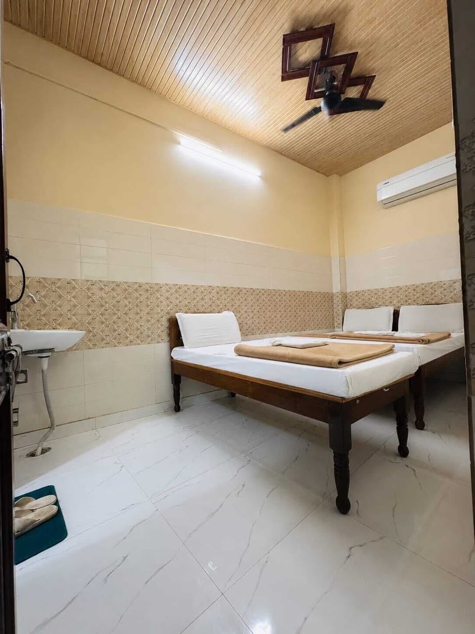 Shower, slippers, towels, soap