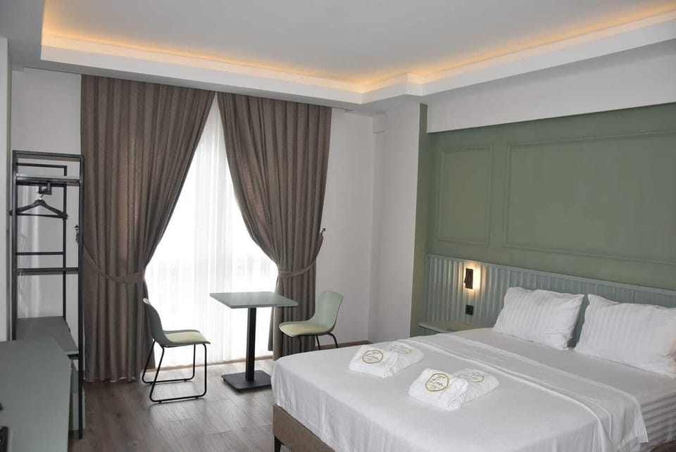 Standard Double Room, Non Smoking, Housekeeping | In-room safe, desk, laptop workspace, blackout drapes