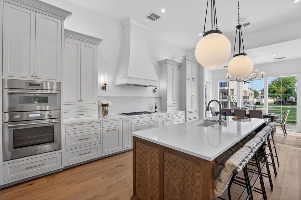 Gas Range, Oven, Microwave, and Spacious Island