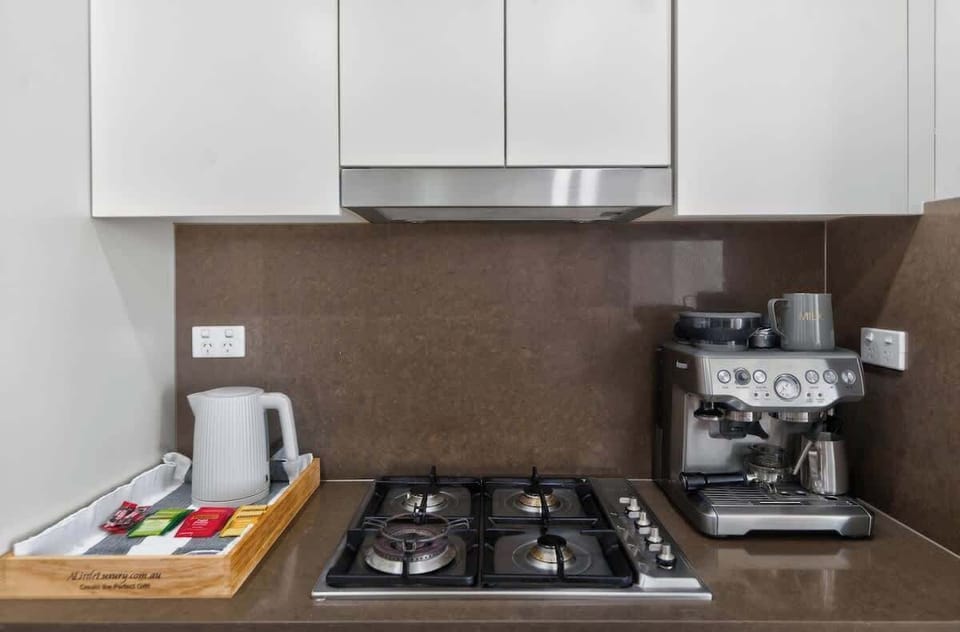 Kitchen including coffee and essentials 