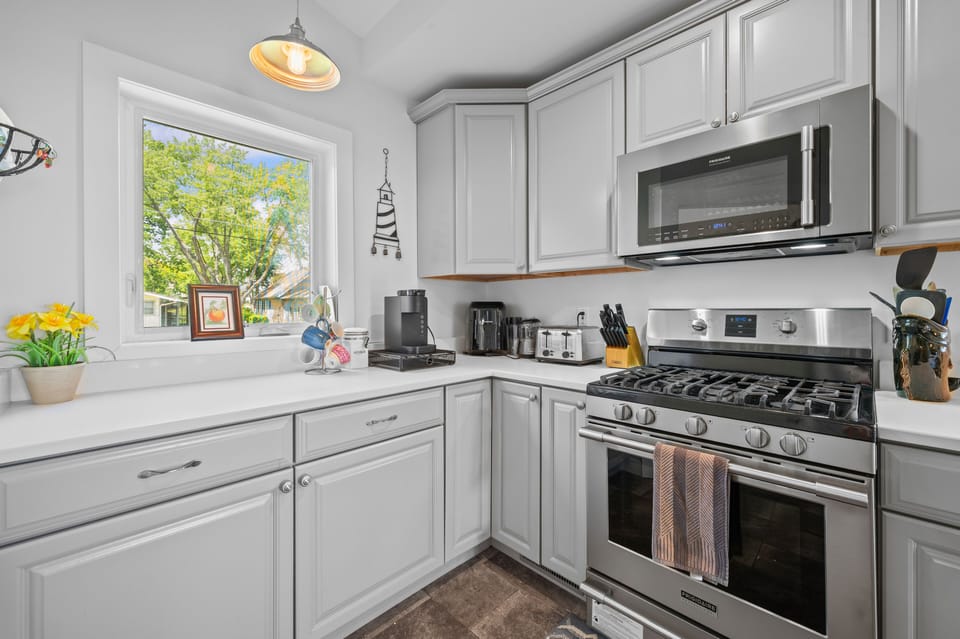 Fully equipped kitchen with generous counter space and storage.