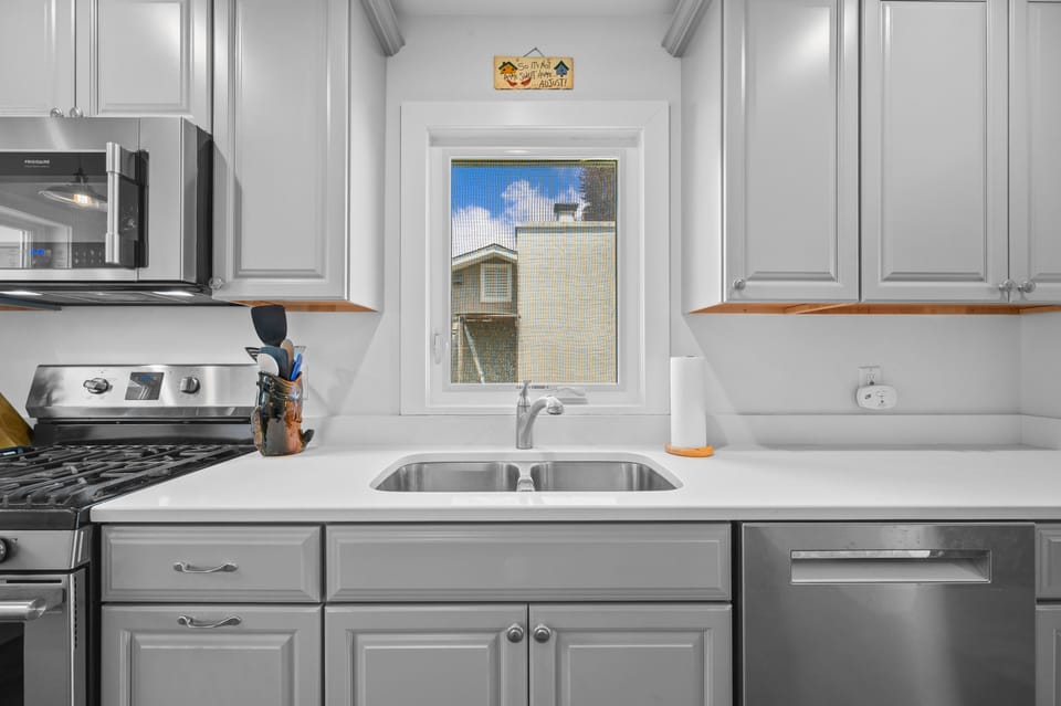 Kitchen sink overlooking the side yard.