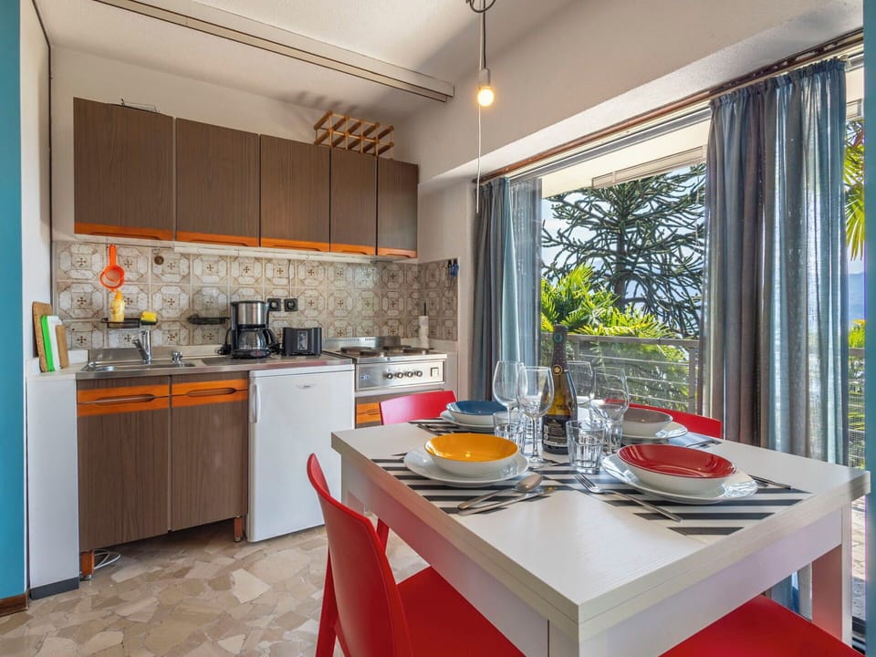 Furniture, Major Appliance, Kitchen, Apartment, Chair, Kitchen Appliance, Resort, Wood Stain, Kitchen & Dining Room Table, Countertop