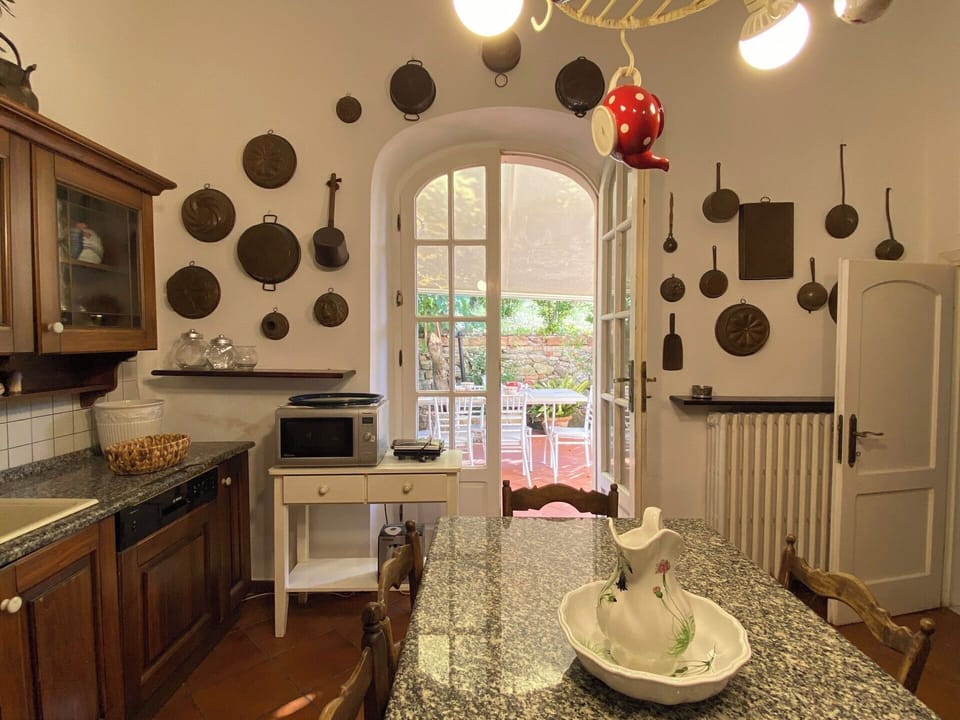 Furniture, Interior Design, Flooring, Wood, Floor, Lighting, Cabinetry, Kitchen, Ceiling, Light Fixture
