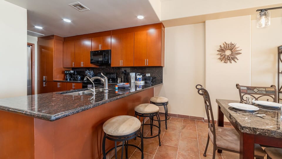 Bar stools at the counter in the kitchen.
