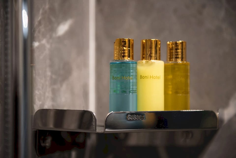 Superior Triple Room | Bathroom amenities | Shower, hair dryer, towels, soap