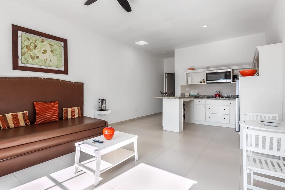 Apartment, 1 Queen Bed with Sofa bed, Partial Ocean View (Jr Suite 4 - Playa Arcangel) | Living area