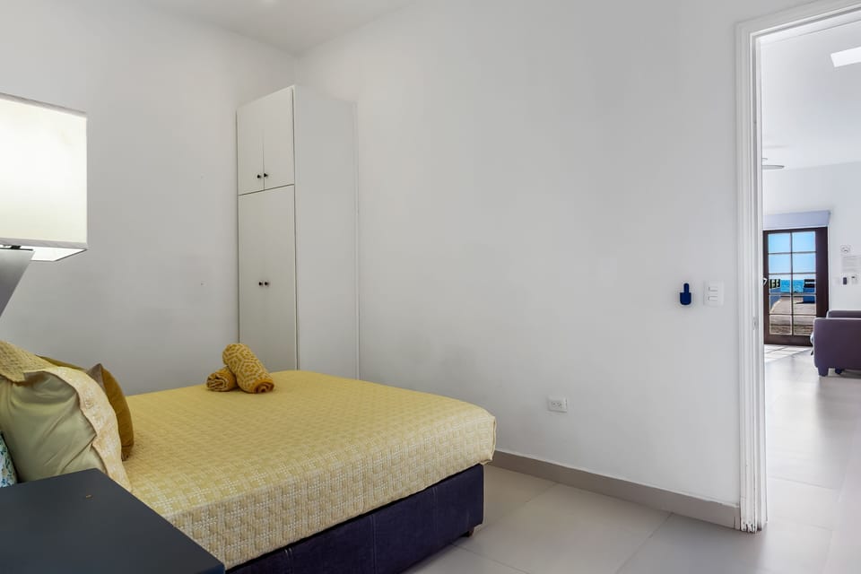 Apartment, 1 Queen Bed with Sofa bed, Partial Ocean View (Jr Suite 3 - Playa Arcangel) | 1 bedroom, individually decorated, individually furnished