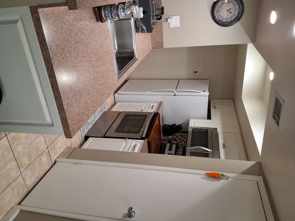 kitchen, indoor, oven, refrigerator, stovetop, microwave