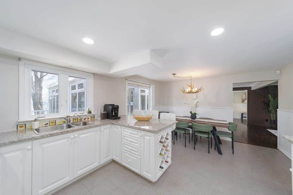 Stylish dining area right by the kitchen.