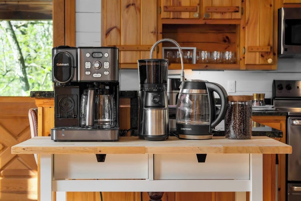 Coffee snobs, rejoice — the kitchen station includes a Cuisinart dual brewer, burr grinder, and electric kettle so your morning cup is exactly how you like it.