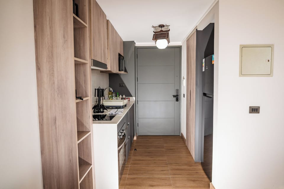 Apartment | Private kitchen | Microwave, oven, stovetop, cookware/dishes/utensils