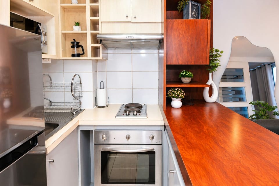 Apartment | Private kitchen | Full-size fridge, microwave, oven, stovetop