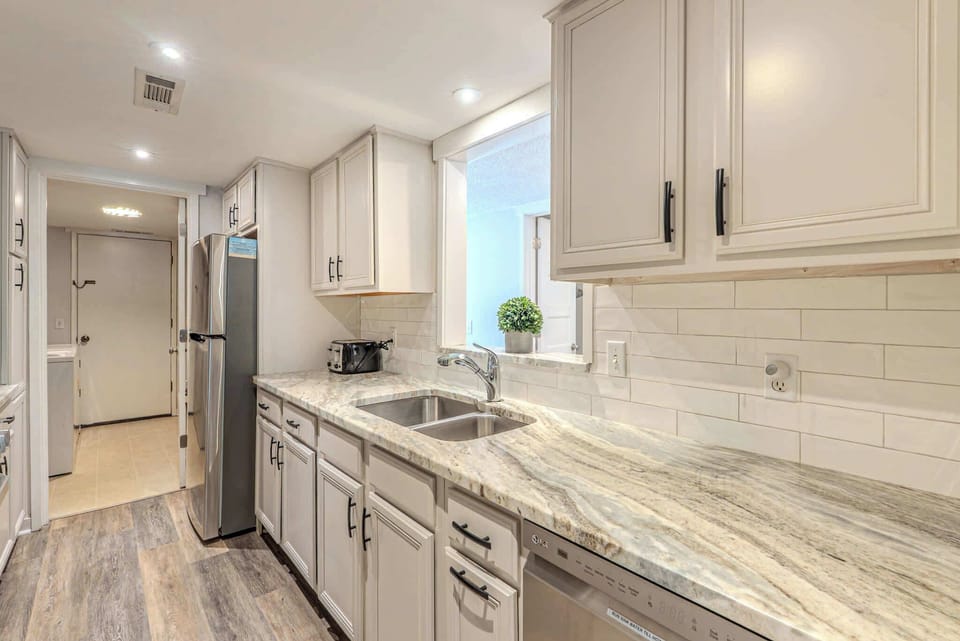 Spacious kitchen stocked with essentials for your stay!