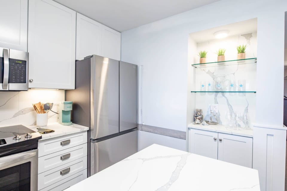 There is also a central island in the kitchen -- great space for prepping your meals.