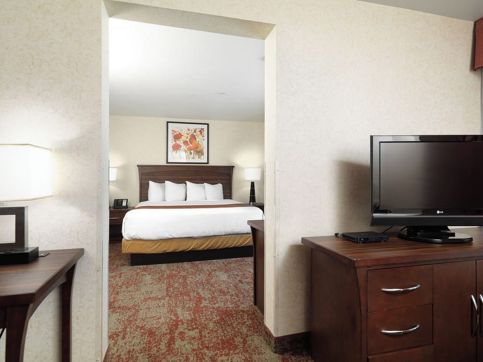 Unwind in a quiet bedroom nook framed by soft lighting.