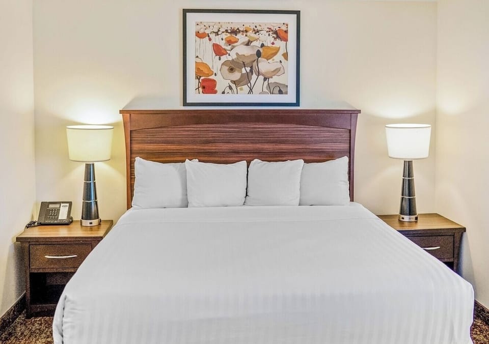 Sink into crisp linens and drift off in total comfort.